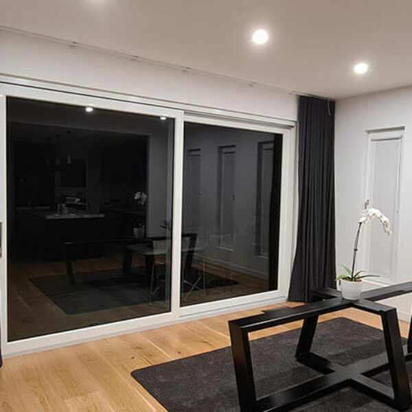 Large UPVC lift and slide door opening from a living room