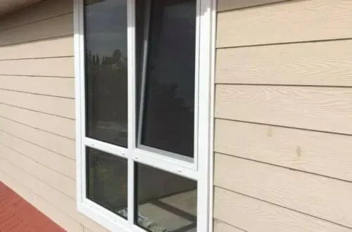 UPVC awning window installed on a weatherboard home