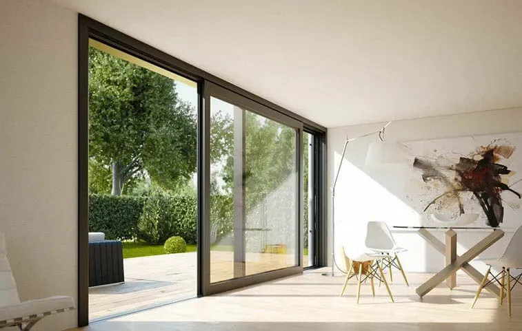 Wide UPVC sliding doors opening a modern living room to the garden