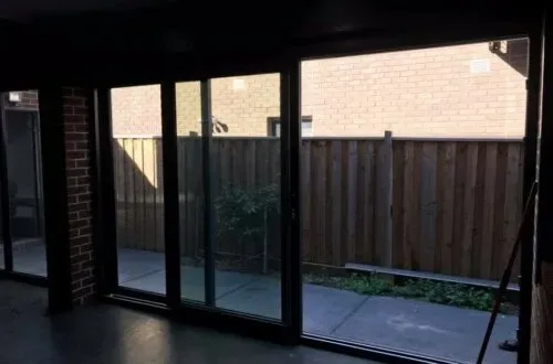 UPVC stacker door opening onto a covered deck